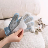 Pet grooming glove in use on dog